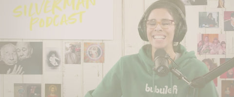 Actress and Comedian Sarah Silverman wearing a green bubuleh hoodie during her podcast.