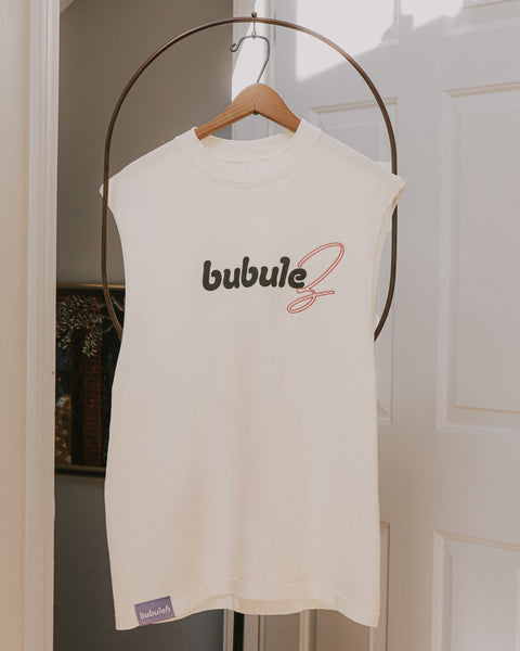 An off white top on a clothing valet stand that says "bubulez" on the front. The shirt is a celebration of the L in LGBTQ for Pride month.