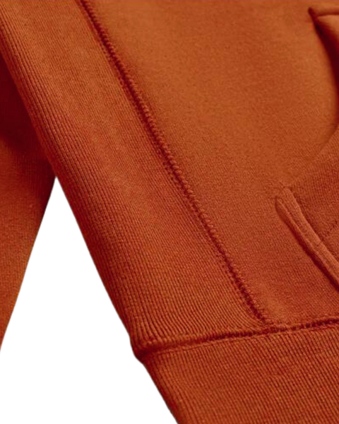 A detail closeup of the bubuleh handcrafted cinnamon heirloom hoodie showing expert stitching.